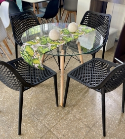 Juego Mesa Eames Vidrio 0.90 diam. + 4 Sillas Varesse Negras